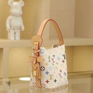 Alternative view of This All In BB handbag showcases playful details from the x Takashi Murakami reissue collection. Monogram coated canvas displays the artist's vibrant rainbow hues, while the signature logo is adorned with bow and padlock accents. Adjustable calf leather handles and a leather shoulder strap allow versatile carrying options—by hand, over the shoulder, or crossbody.Dimensions: 16*12*18cm